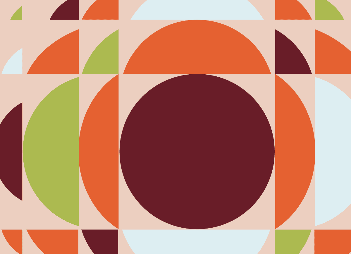 An abstract pattern of orange, green, burgundy and pale blue half-circles around a large burgundy circle on blush pink