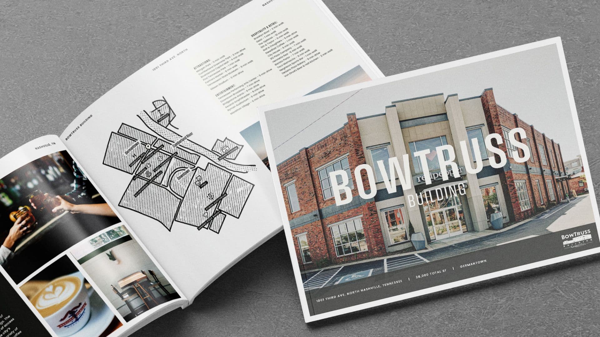 A top-down shot of a marketing brochure and a separate card on a gray surface. The open brochure displays an architectural floor plan, while the card features a full-color photo of the "BOW TRUSS BUILDING" with its address.