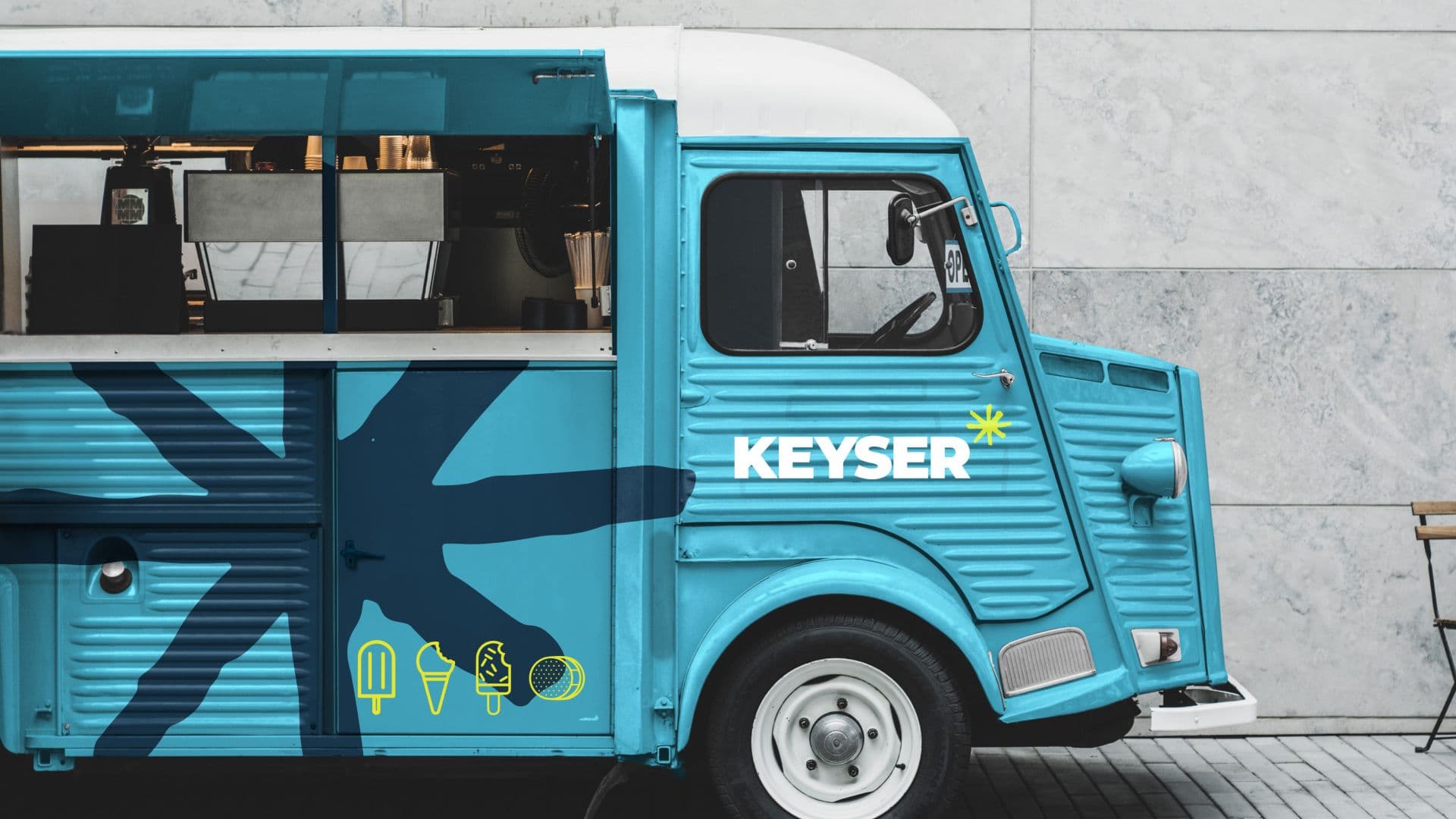 Blue truck with the Keyser asterisk on the side, and the Keyser logo.