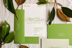 Frist Art Museum invitation suite among magnolia leaves